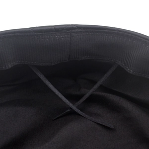 Detail of leather military hat interior featuring adjustable drawstring and woven sweatband