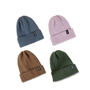 Knitted beanie hats for men and women in blue, purple, brown and green with freedom label