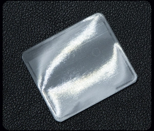 Macro shot of self-adhesive transparent PE jewelry bag with textured non-slip surface
