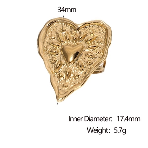 Detail view of gold-plated heart ring with hammered texture and precise size measurements
