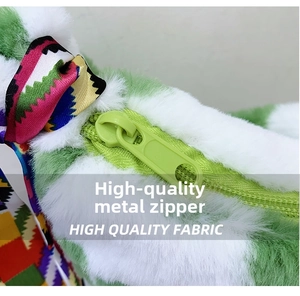 Detail of high-quality green zipper and colorful webbing on plush floral handbag