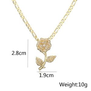 Detail of 18K gold plated rose pendant measuring 2.8cm by 1.9cm with pavé zircons