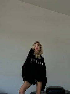 Oversize black hoodie for women with white KRAINE letter print in a loose casual style