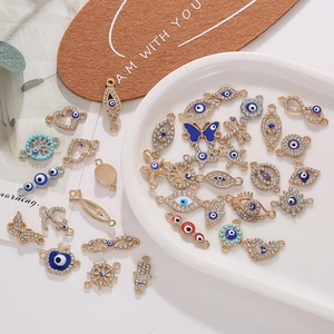 Mix of Evil Eye and Hamsa Hand charms in gold finish for DIY jewelry making