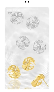 Detailed close-up of S925 sterling silver ginkgo leaf studs with zircon accents