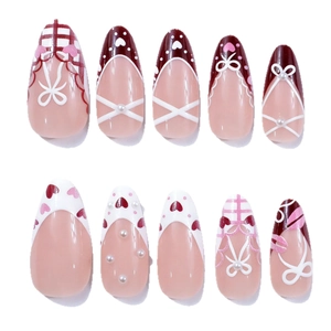 French long almond press-on nails with 3D pearls, heart patterns and bow ties