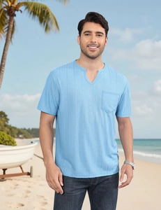 Detail of sky blue knit t-shirt featuring vertical texture and a practical chest pocket