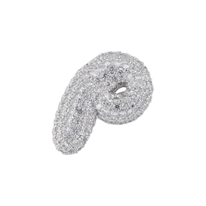 Macro shot of silver-tone bubble letter P pendant with full cubic zirconia stones