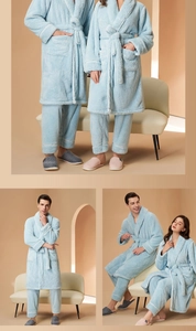 Close-up detail of soft thick flannel pajamas with delicate white edge piping
