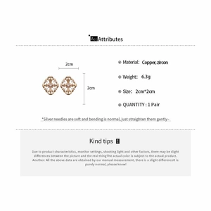 Macro shot of rose gold cross earrings with white zircon detailing and size measurements
