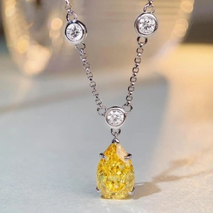 S925 sterling silver necklace with yellow teardrop stone and round accents