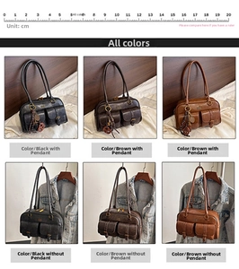 Detail showing vintage Boston bag in black, coffee, and brown leather with double pockets