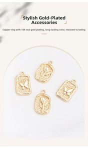 Macro shot of 14K gold plated butterfly and rose charms with vintage relief details