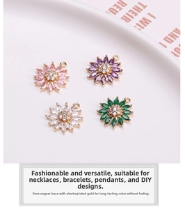 Close-up of colorful daisy pendants in gold-plated copper with sparkling zircon crystals