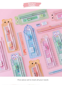 Detail view of colorful animal-themed 5-piece stationery sets with pencils and rulers