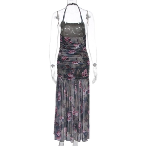 Detail of halter neck mesh maxi dress with vintage rose print and ruched bodycon texture