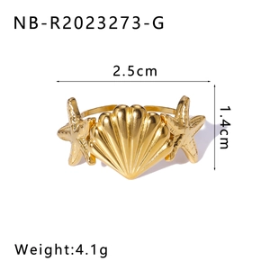 Detailed view of 18K gold starfish and seashell ring with size and weight dimensions
