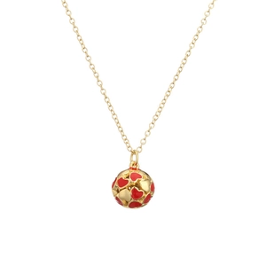 Fashionable gold copper necklace with red enamel heart pendant on a white background