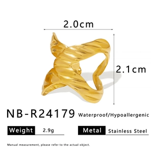 Macro view of gold stainless steel twisted ring showing weight and dimension details