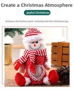 Detail of snowman Christmas gift bag with heart-shaped window and soft plush fabric