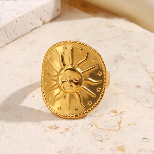 Ethnic style stainless steel ring with sun face relief and star engraving in gold finish