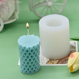 Cylindrical grid silicone mold for DIY scented candles with light blue diamond pattern