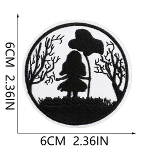 Round black and white embroidery patch with tree and girl silhouette, 6cm diameter