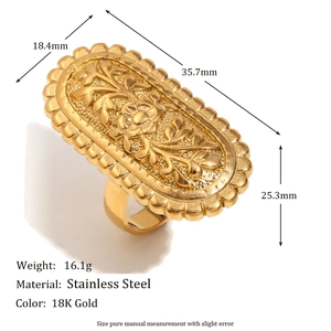 Detail of 18K gold-plated stainless steel oval ring featuring vintage floral relief