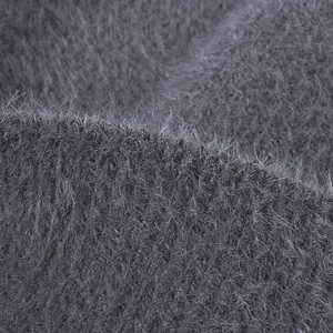 Thick dark gray feather yarn beanie with soft fluffy knit texture for winter warmth