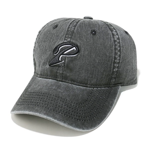 Close-up of vintage washed cotton baseball cap with embroidered letter P and stitching