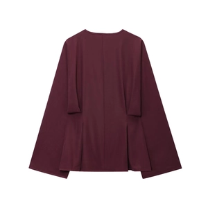 Detail view of burgundy long sleeve blouse back featuring pleated waist accents