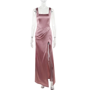 Detail of elegant satin maxi dress featuring a square neckline and ruched waist design