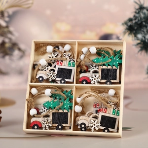 Set of 4 festive wooden Christmas truck ornaments with jute ropes in a display box