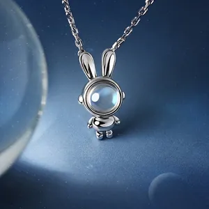 Astronaut rabbit necklace with moonstone pendant in S925 silver on starry background