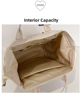 Spacious beige nylon backpack interior with multi-functional pockets and zipper