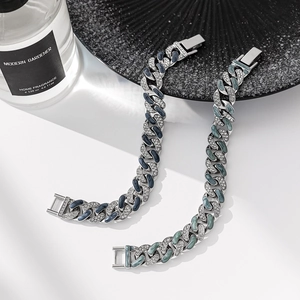 Cuban link bracelet set with crystals and enamel in navy and sage on white background