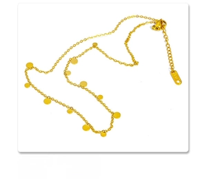 Detailed macro view of 18K gold plated titanium steel choker with small disc pendants