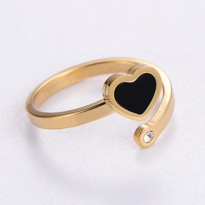 Gold stainless steel open ring featuring a black heart inlay and a small white diamond