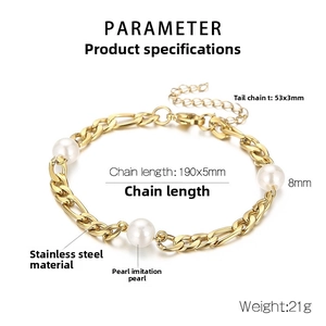 Macro view of gold stainless steel Figaro chain bracelet with 8mm white pearls and extender