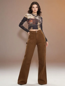 Full shot of woman in brown cargo pants and vintage print long sleeve crop top