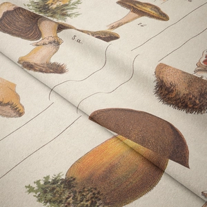 Detailed close-up of mushroom print on beige bohemian fabric with natural texture