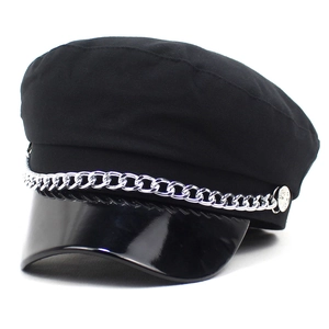 Classic black baker boy cap with shiny patent leather brim and silver metal chain