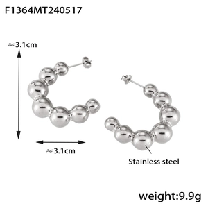 Polished stainless steel beaded hoop earrings with 3.1cm diameter and 9.9g weight details