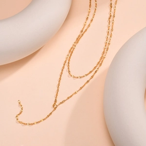 18K gold double layer lip chain necklace set on minimalist geometric display props