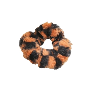 Fuzzy leopard print plush scrunchie with orange and black spots for girls hair styling