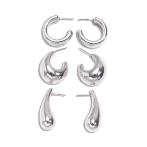 Three-pair silver geometric earring set featuring chunky hoops and waterdrop studs on white background