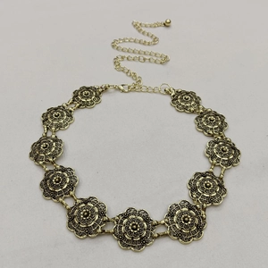 Elegant gold metal waist chain belt with carved flower pattern for women Western style