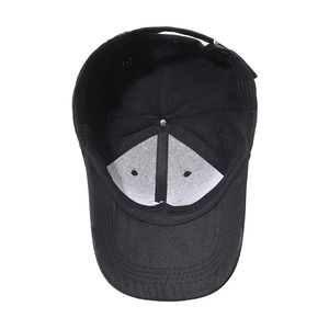Black cotton baseball cap with white mesh lining and adjustable strap on white background