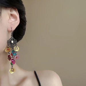 Bohemian vintage long tassel earrings with colorful resin shell discs and metal flower