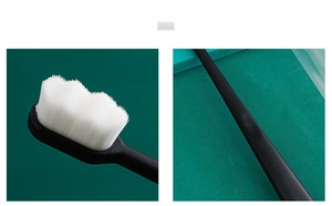 Close-up of fine nano bristles and sleek black matte handle of the soft toothbrush